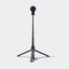 A black golf tripod stand with an adjustable central pole and a round black top cap, shown on a clean light gray studio background.