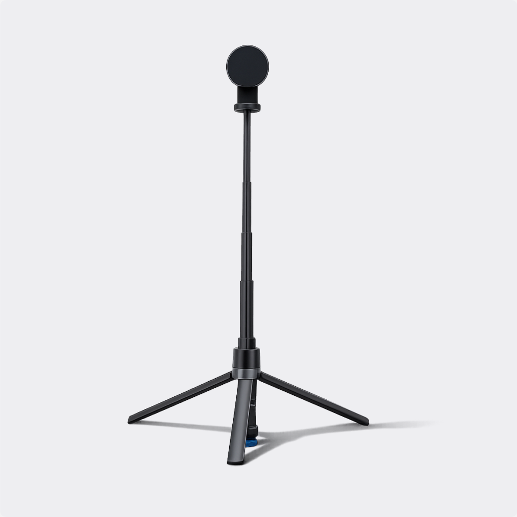A black golf tripod stand with an adjustable central pole and a round black top cap, shown on a clean light gray studio background.