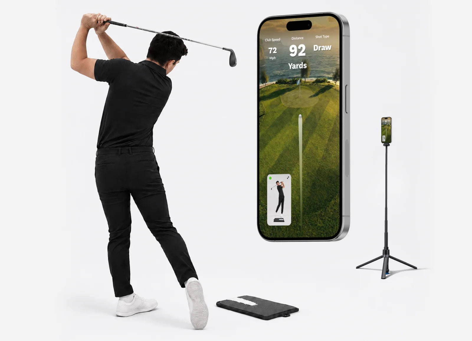 Full swing with the phone on the tripod and the mat on the floor