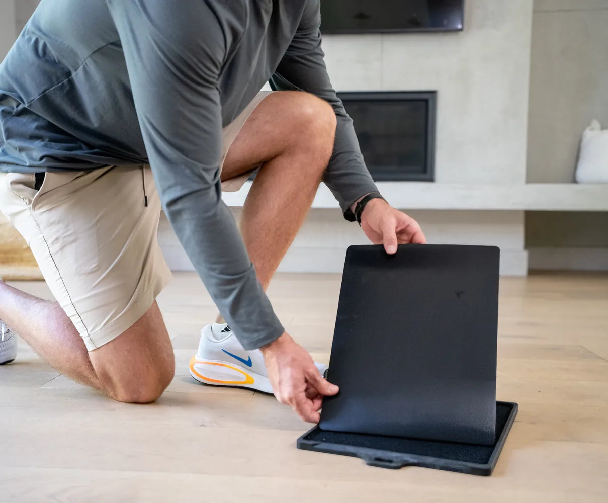 Peeling the old pad off the mat