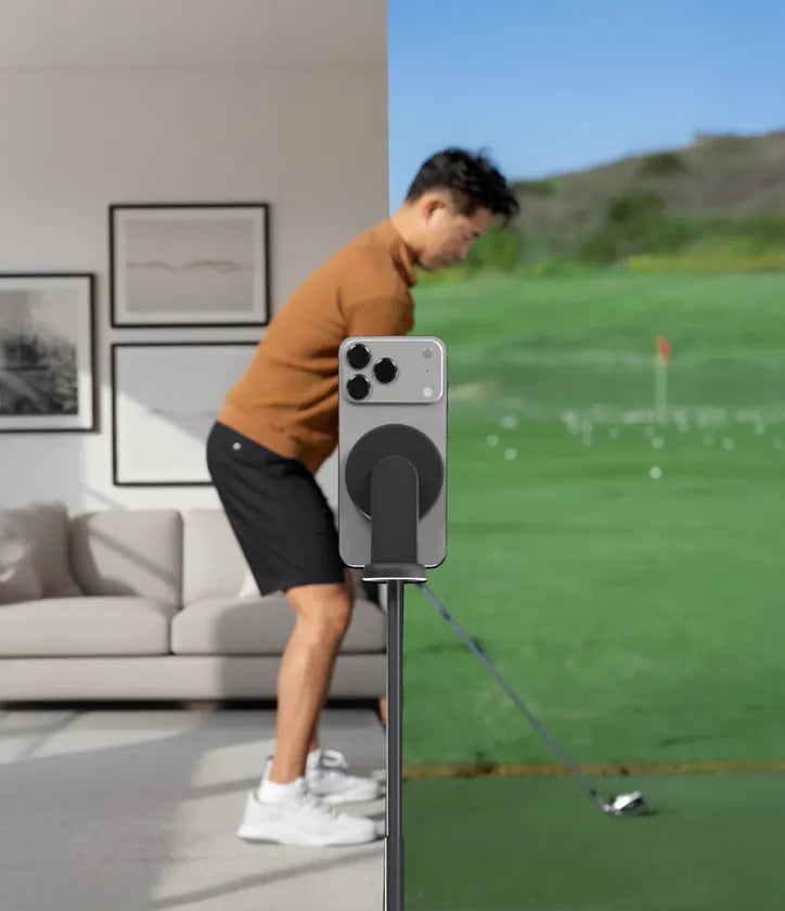 Send a swing: a phone on the tripod filming a swing, the range on the other half