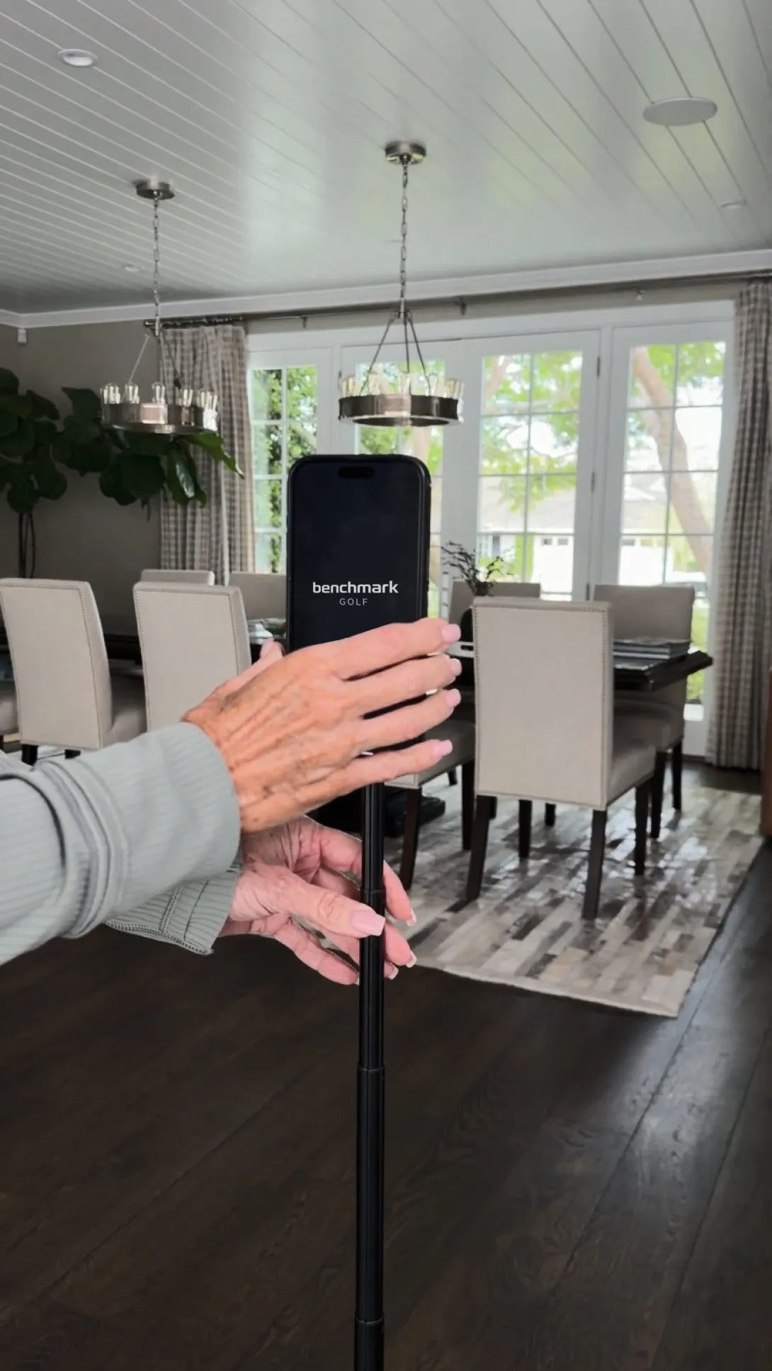 Snap your phone onto the mount and swing